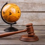 brown globe with gravel international law