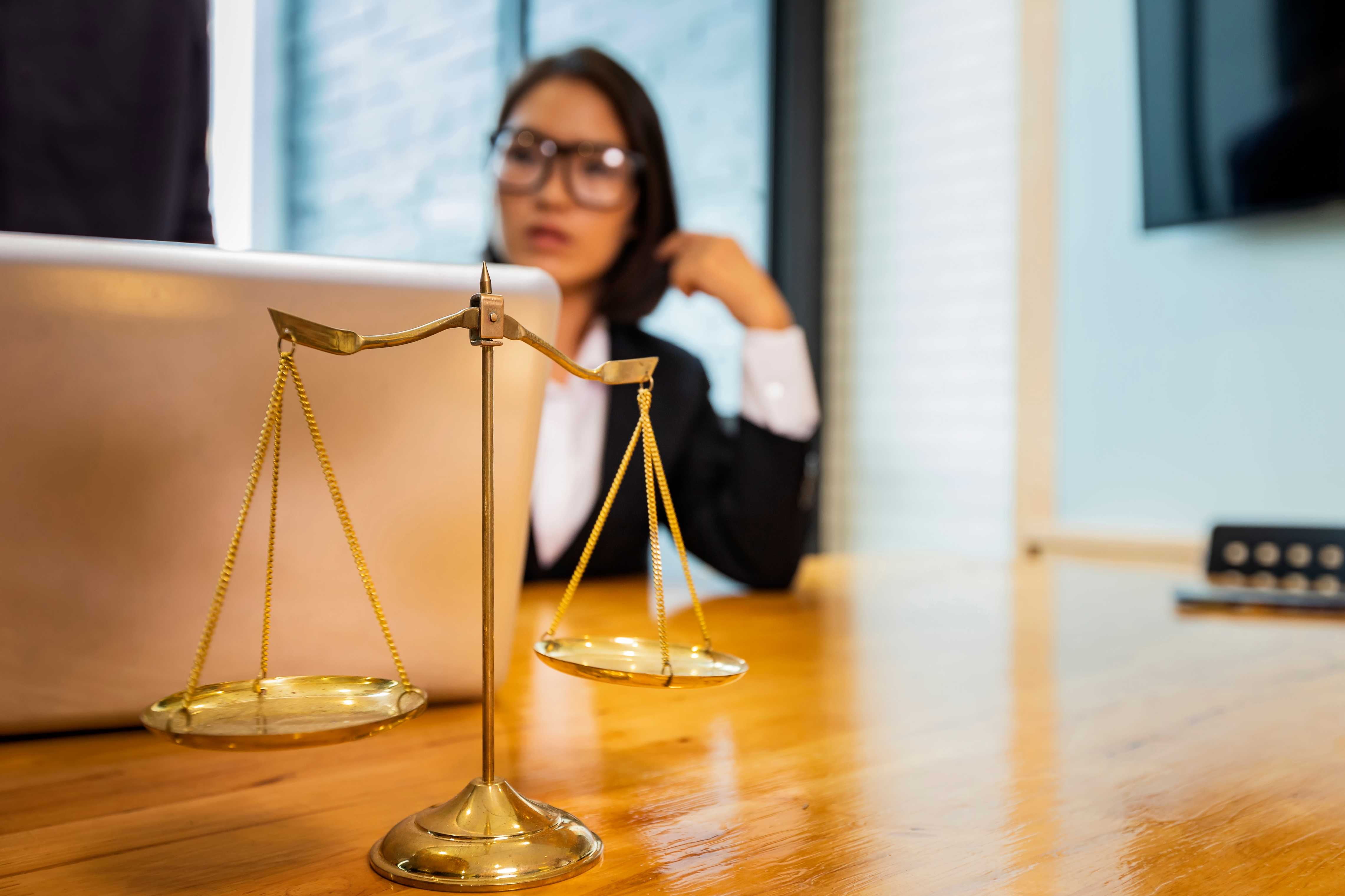 lawyer with a laptop on table
